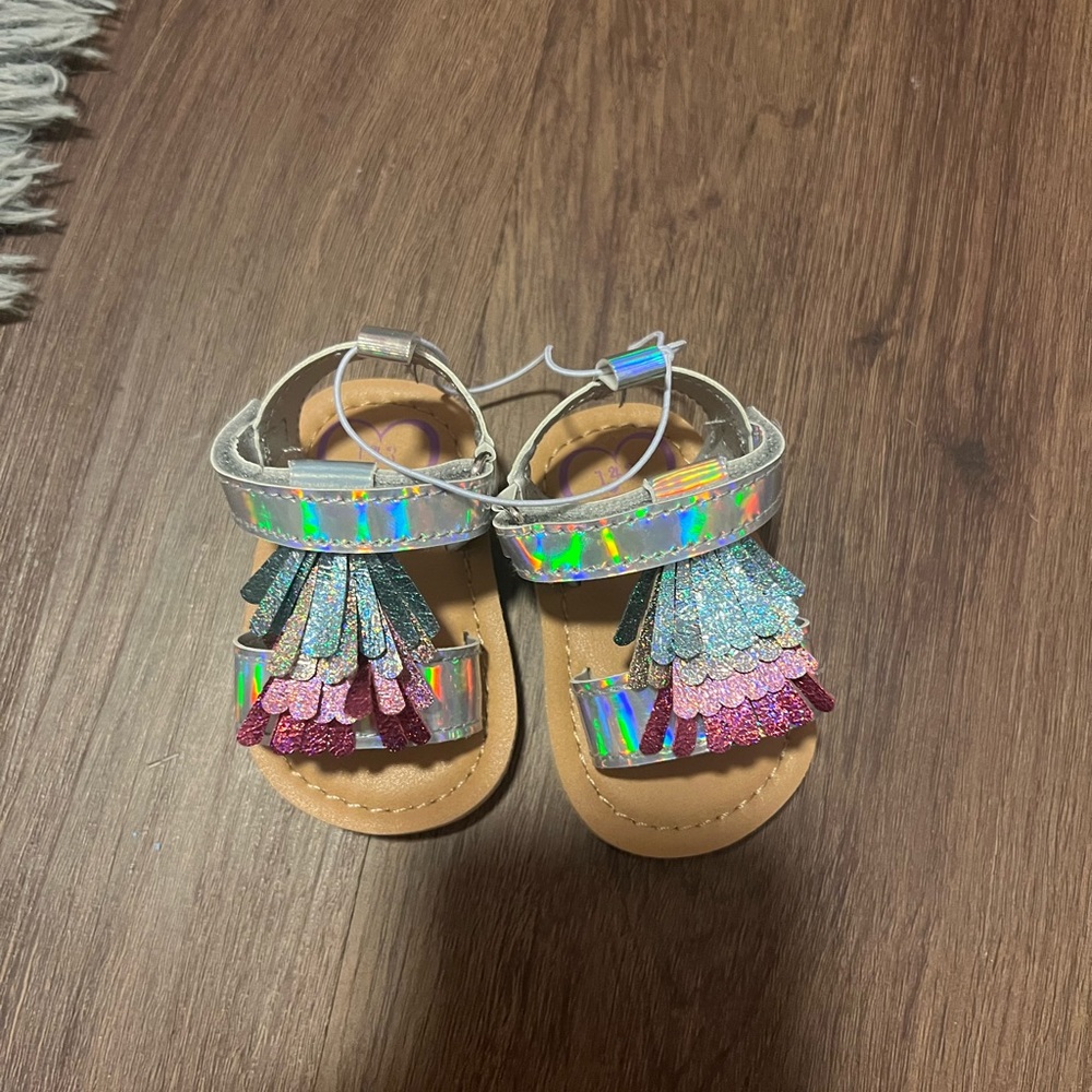 Baby sandals never worn still in box